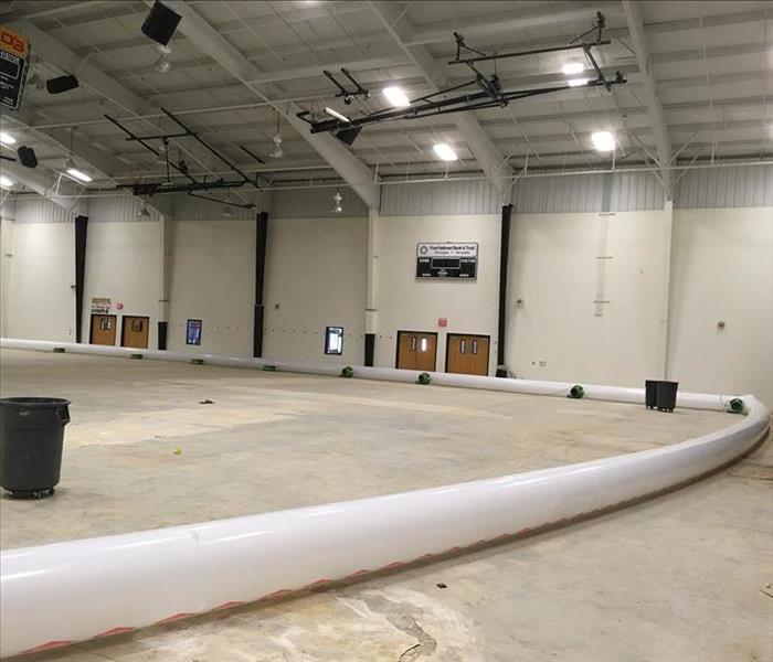 Large gymnasium with drying equipment.