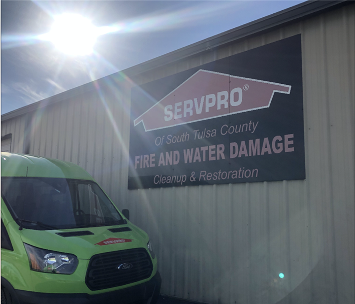 SERVPRO of South Tulsa County sign on side of warehouse.