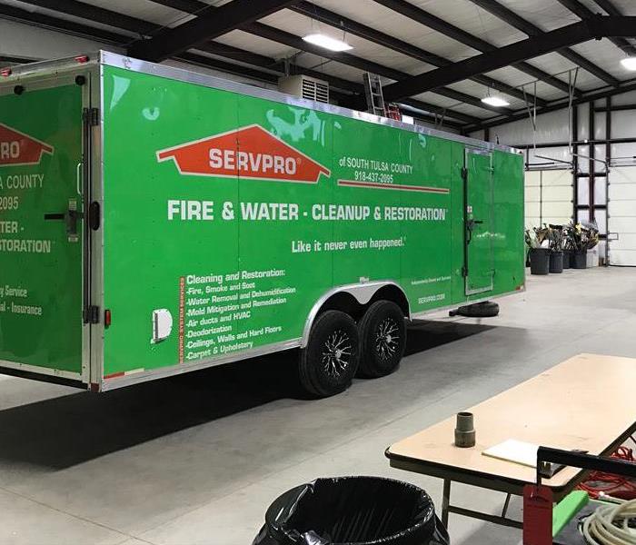 SERVPRO trailer parked in warehouse. 