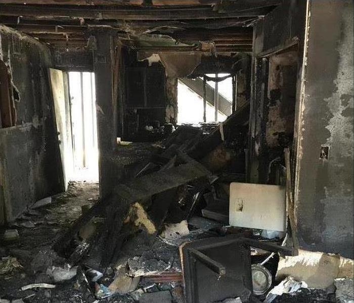 Interior of a home damaged by fire.